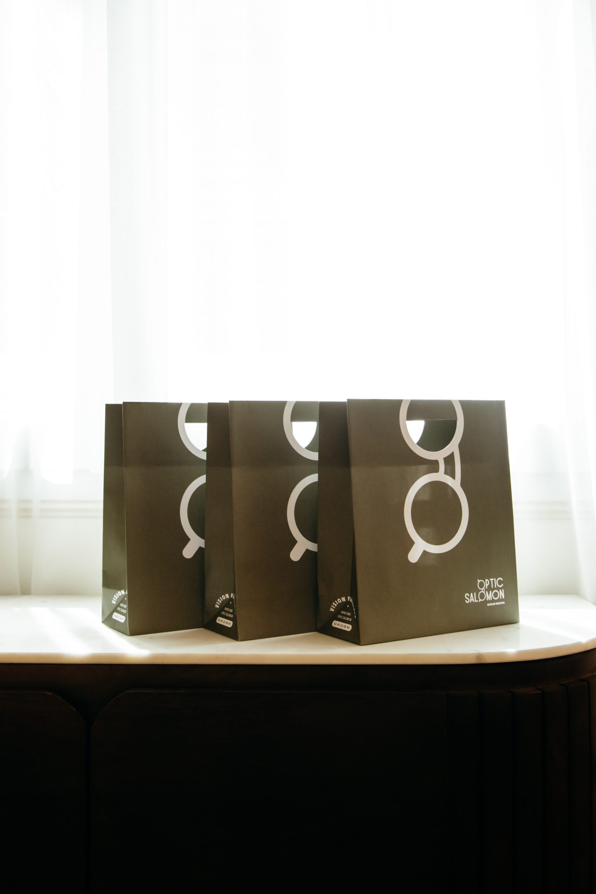 Optic Salomon, opticien indépendant au Croisic, refonte identité pour leurs 20 ans par le Studio La Rusée.