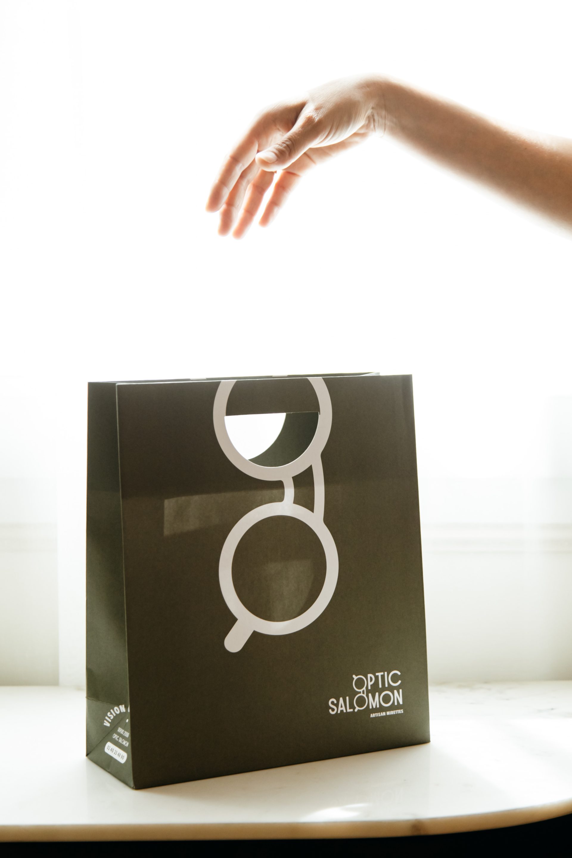 Optic Salomon, opticien indépendant au Croisic, refonte identité pour leurs 20 ans par le Studio La Rusée.